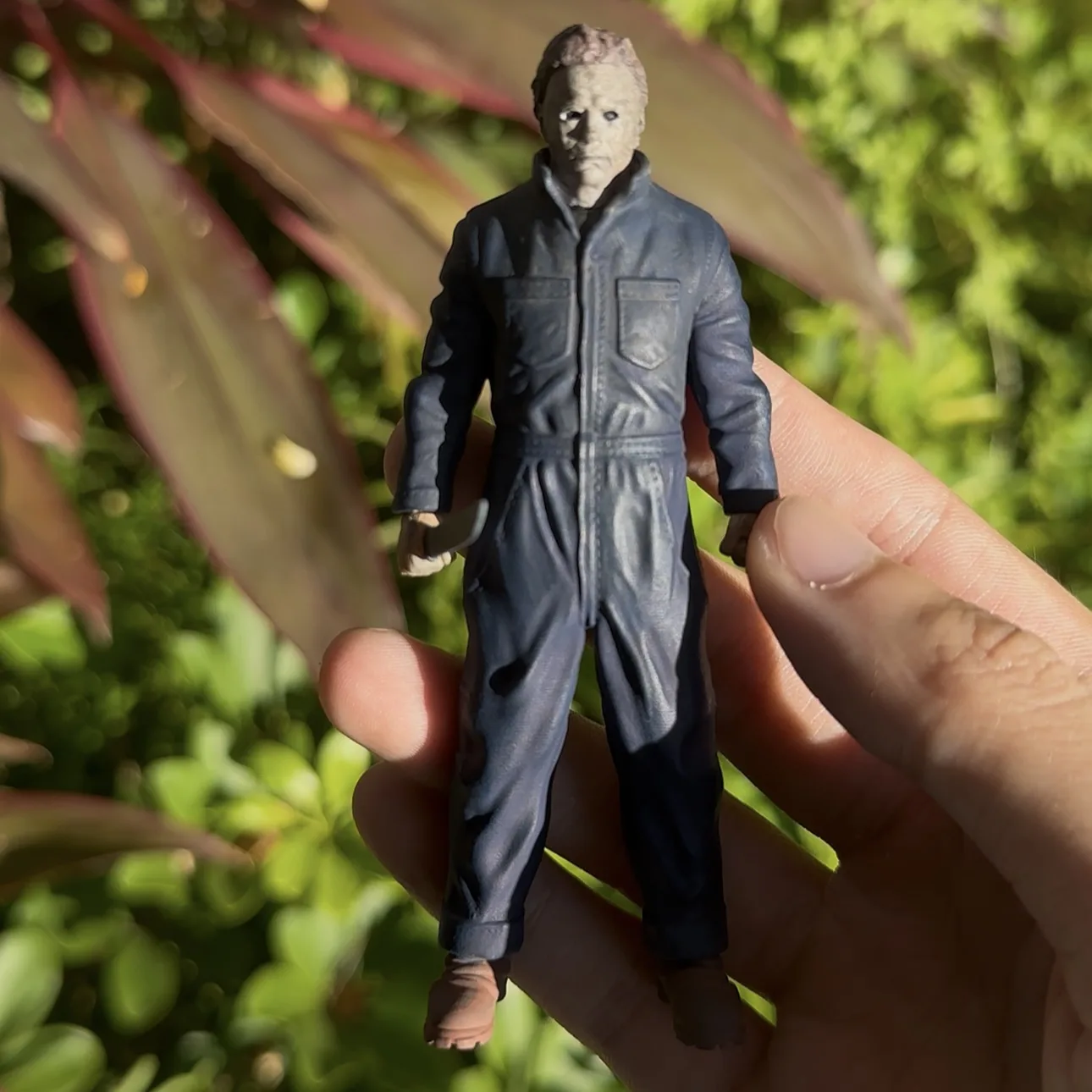 Masked stalker in navy coveralls, 1:18, hand-held photo
